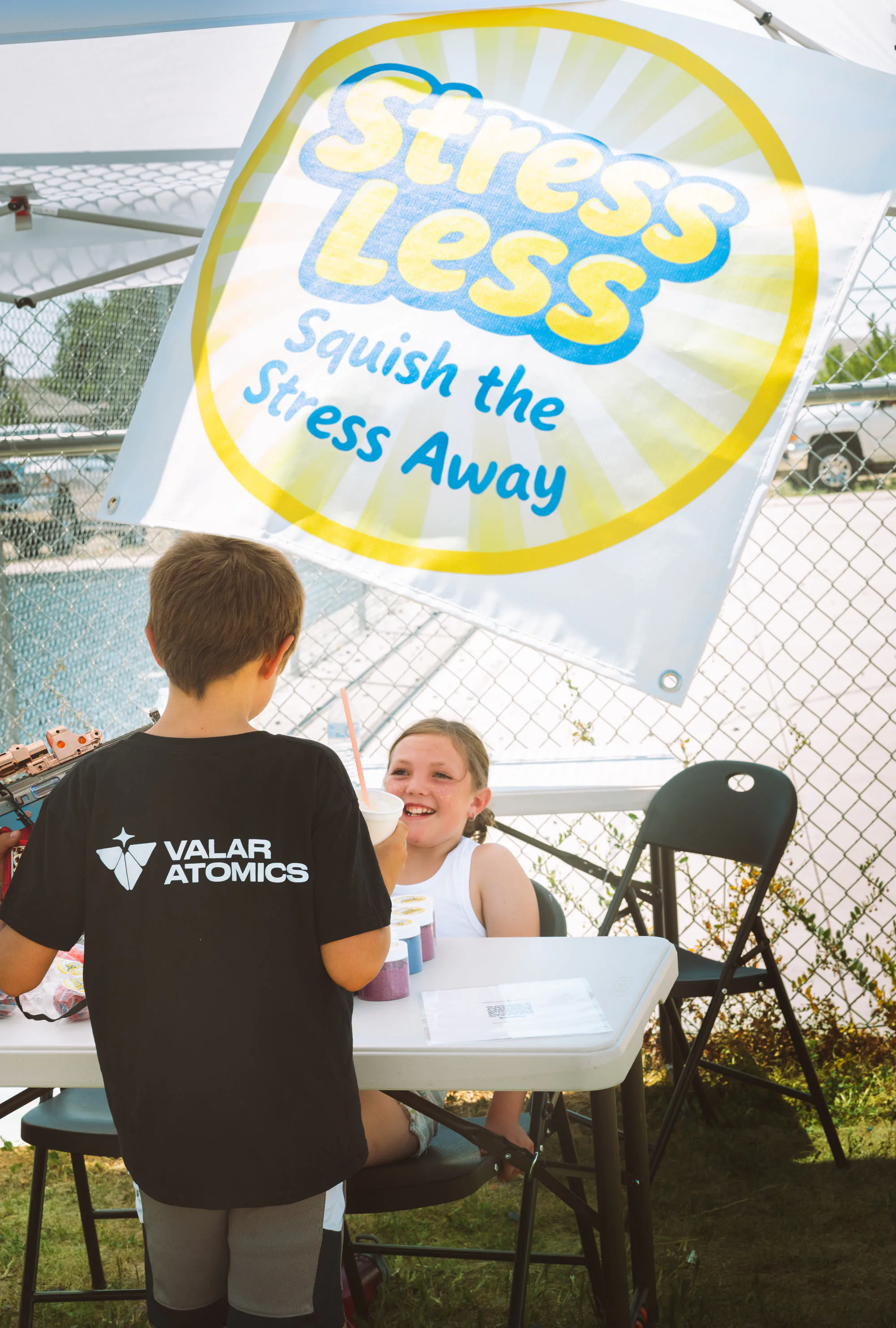 Kids at the Valar Atomics fair booth